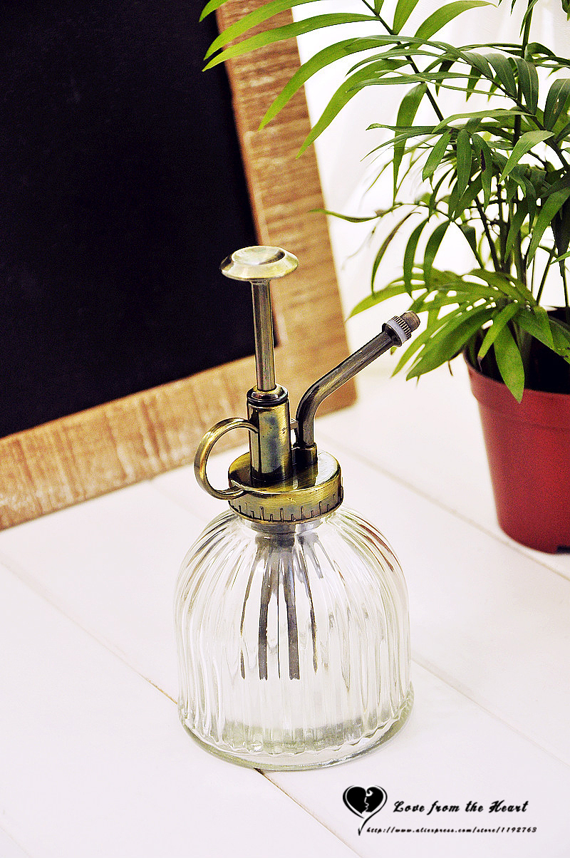 Free-shipping-New-2014-Zakka-Hot-selling-Colored-stripes-glass-watering-can-Gardening-Fashion-watering-tool.jpg
