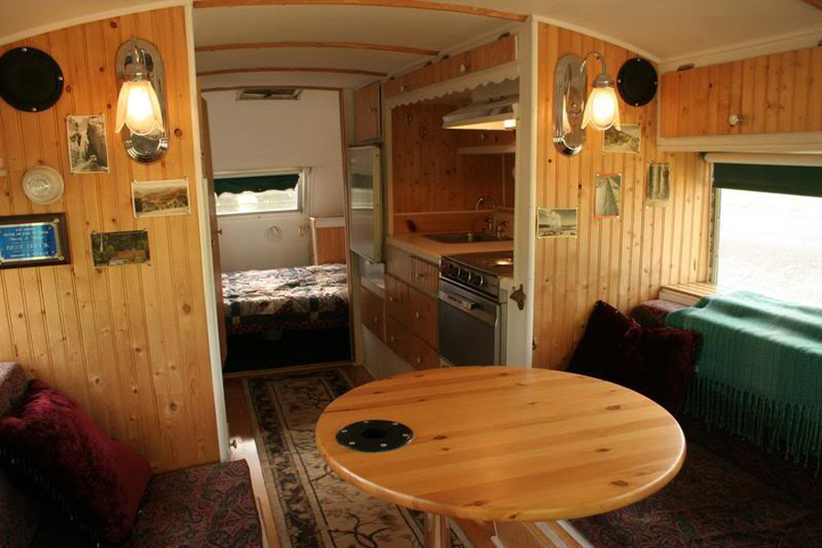 The-Emerald-Gypsy-Vintage-Bus-Conversions-Interio-Dining-Area.jpg