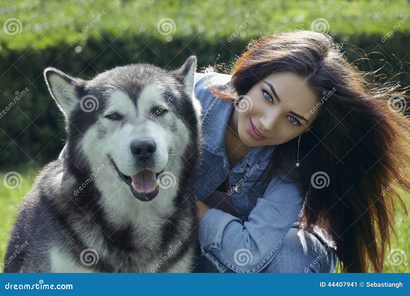 beautiful-woman-malamute-dog-portrait-young-lady-blue-eyes-long-hair-wearing-blue-jeans-posing-big-alaskan-male-44407941.jpg