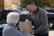 man-helping-elderly-woman-groceries-1176576-wallpaper.jpg