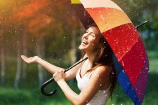 Happy-woman-in-the-rain-Stock-Photo.jpg