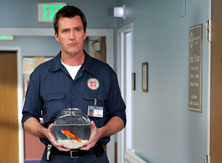 janitor-holds-a-goldfish.jpg